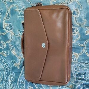 Men's brown Coach bag